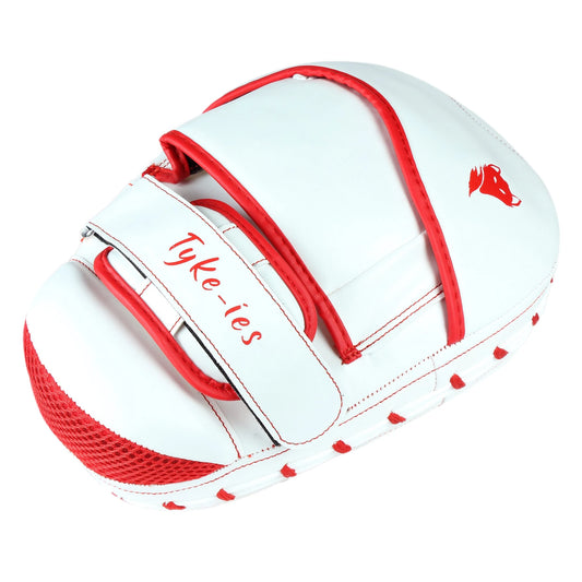 Side view of white and red Bulls-Eye pads showing the shock-absorbing foam thickness.