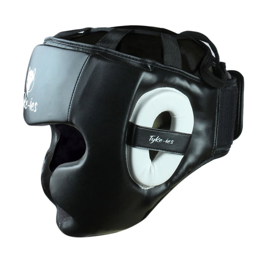Side profile of black Tyke-ies Shield headguard highlighting ear and cheek coverage.