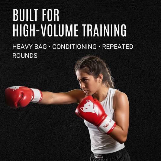 Tyke-ies Sleek red and white boxing gloves for heavy bag and high-volume training