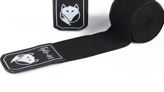 Tyke-ies professional hand wraps showcasing the elasticated cotton polyester blend material and fox logo.
