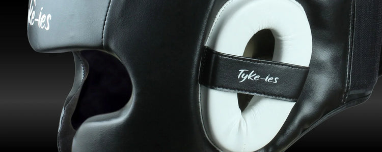 Detailed profile of Tyke-ies Protective Tier gear highlighting high-density foam and anatomical safety curvatures.