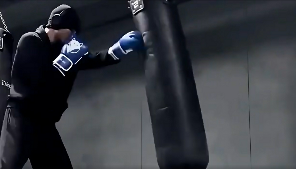 Load video: Embedded video showcasing the Tyke-ies Sleek Model boxing gloves. The video highlights the unique texture of the PIN DOT Flex PU material and the ergonomic, high-performance fit for professional fighters.