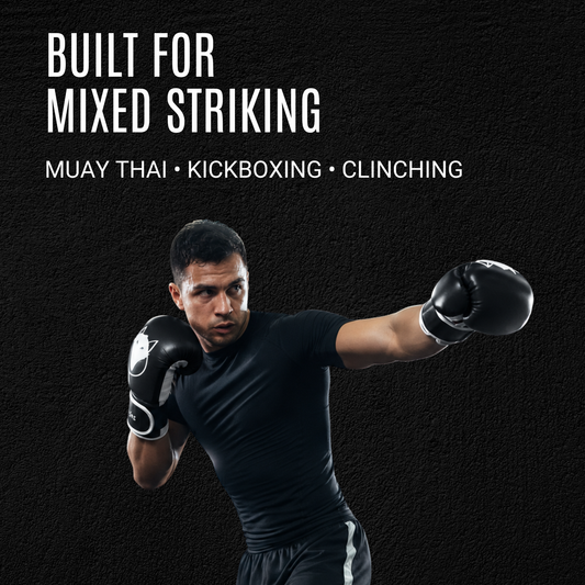 Tyke-ies black SWIFT boxing gloves for Muay Thai, kickboxing and mixed striking