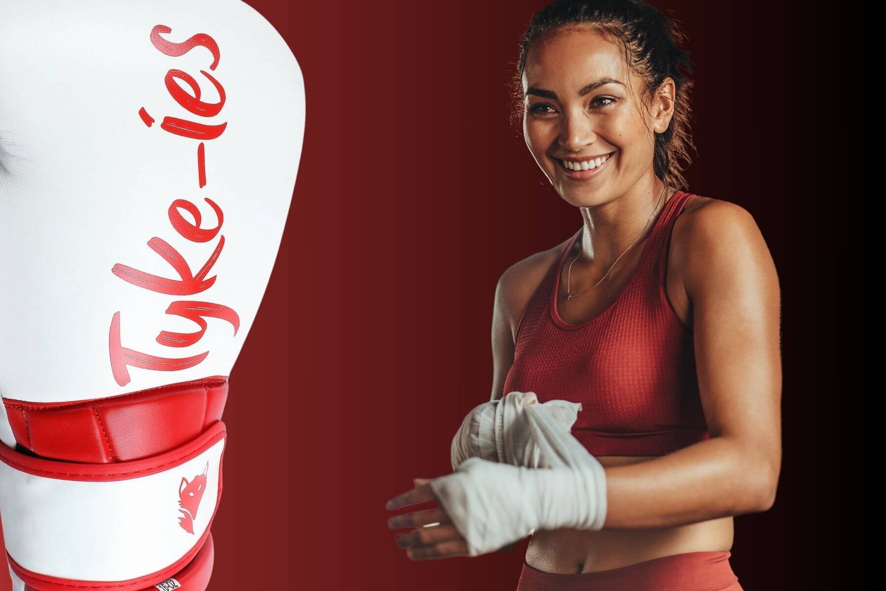 Tyke-ies boxing gloves collection featuring professional training gloves, sparring gloves, and competition gloves in white, red, blue and black, ideal for fighters of all levels.