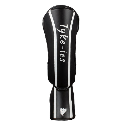 Technical detail of black Tyke-ies Defend shin guard showing reinforced instep padding.