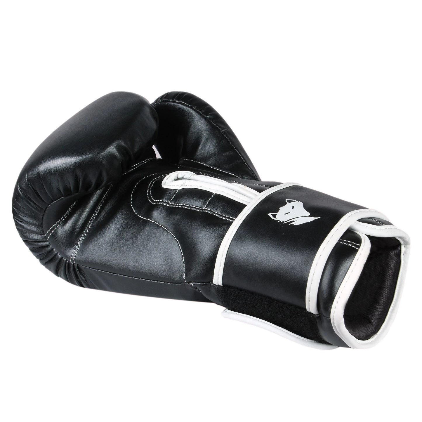 Inner palm and wrist strap detail of black Tyke-ies Agile boxing gloves for secure fit and support.