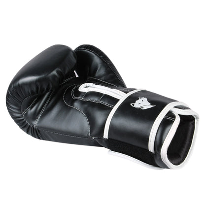 Inner palm and wrist strap detail of black Tyke-ies Agile boxing gloves for secure fit and support.