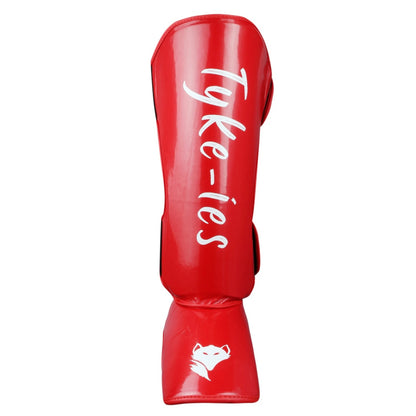 Technical view of red Tyke-ies Protect shin guard highlighting the impact-shield foam.