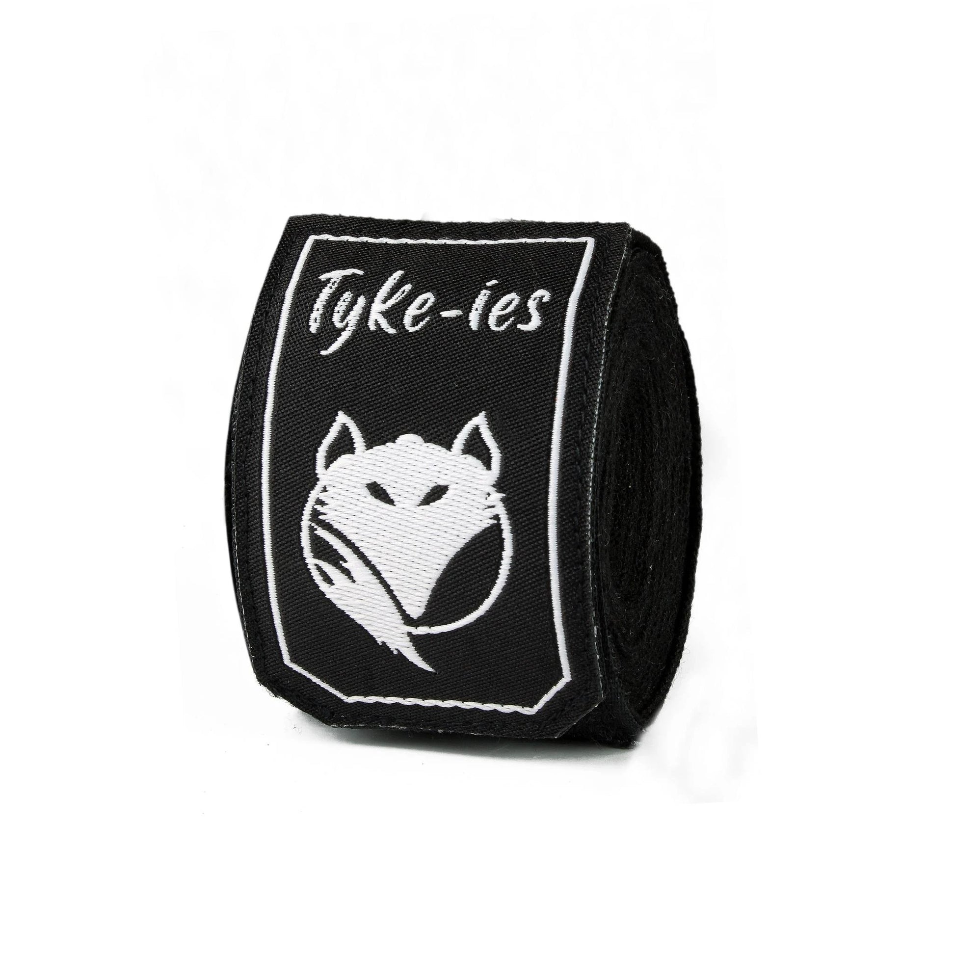 Black Tyke-ies Pure hand wraps in a compact rolled view showing the durable fabric.