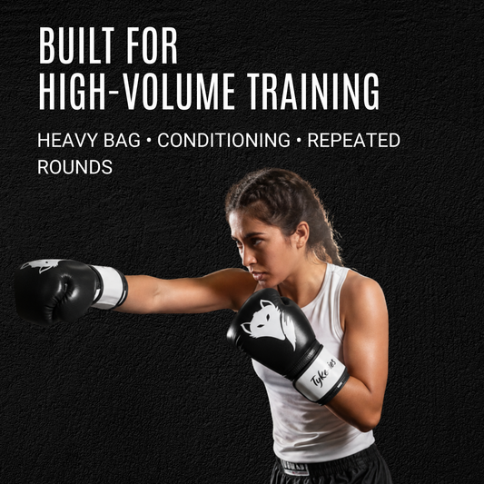Tyke-ies Sleek black and white boxing gloves for heavy bag and high-volume training